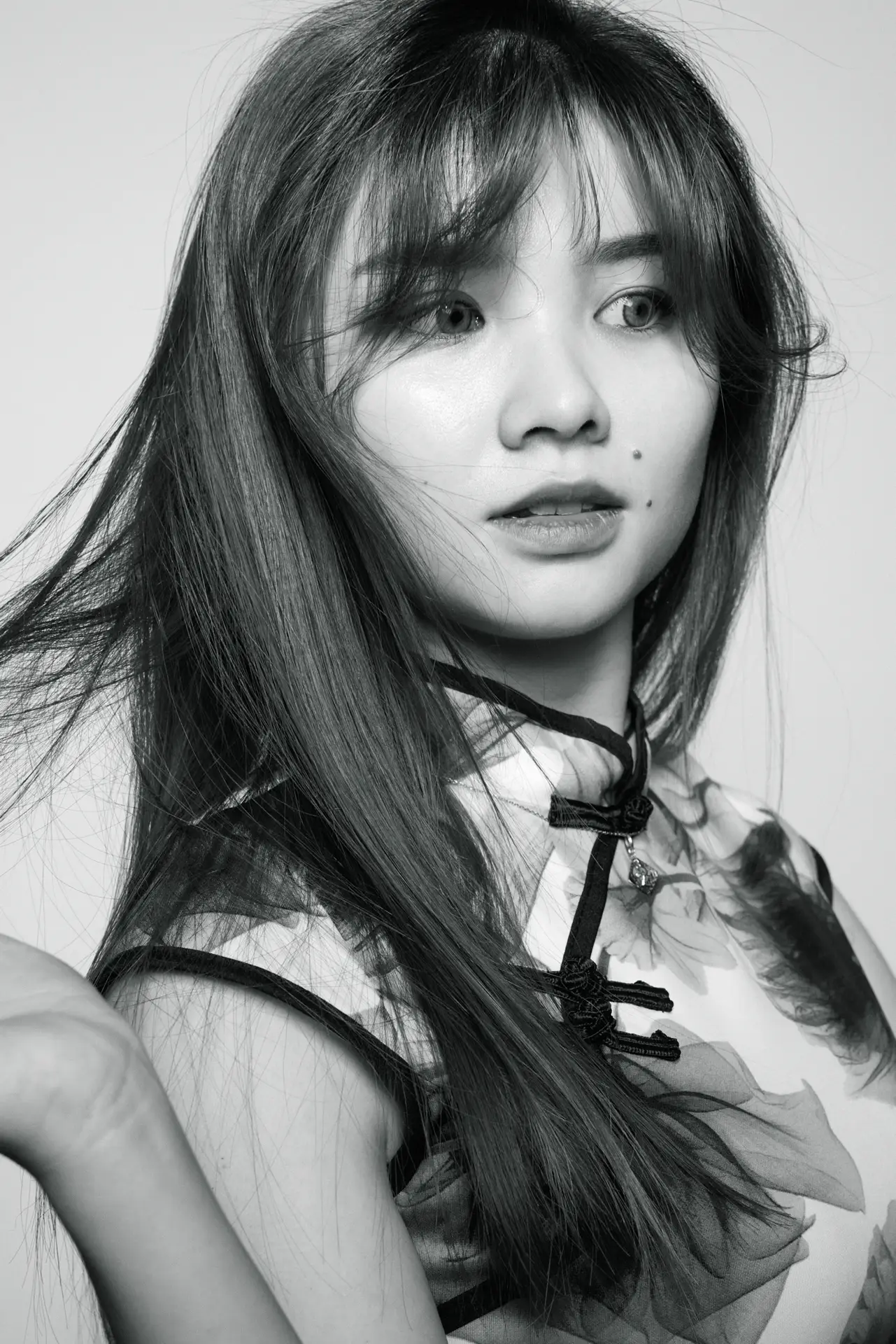 Close-up beauty portrait showing professional retouching standard, skin texture preservation, commercial photography Malaysia